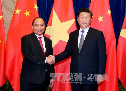 Prime Minister Nguyen Xuan Phuc meets Chinese Party General Secretary and President Xi Jinping  - ảnh 1